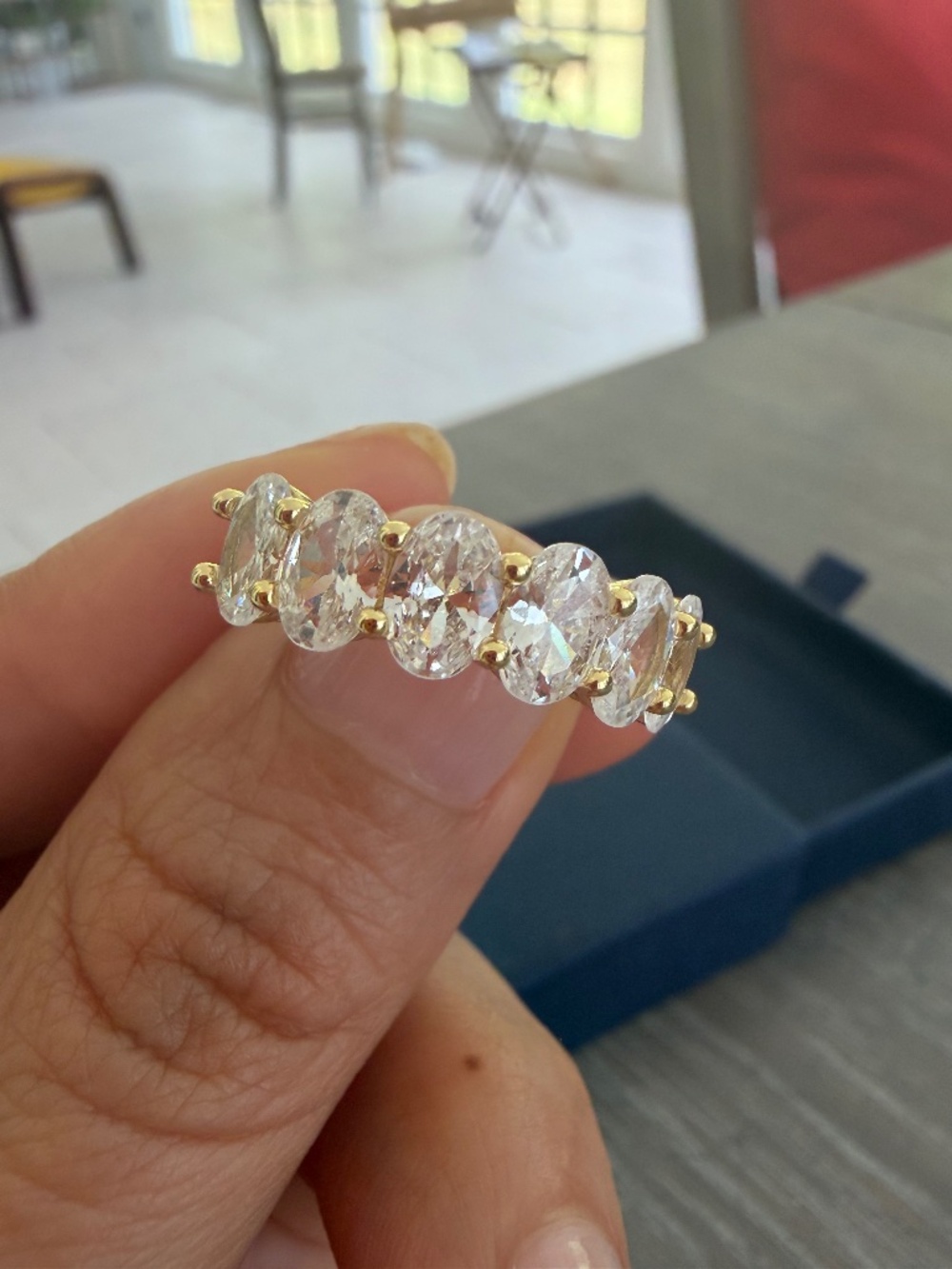 Luca Smith Gold-Plated Oval Cut Cubic Zirconia Eternity Band Ring (Size 6)
